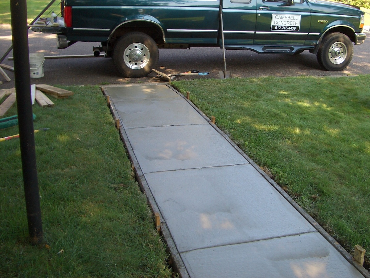 Freshly poured concrete sidewalk